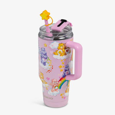 Angle View | The Care Bears™ 32 Oz Travel Mug::::Fits most cup holders